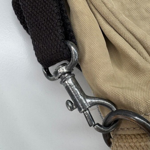 Kipling beige crossbody bag used with multiple compartments and strap