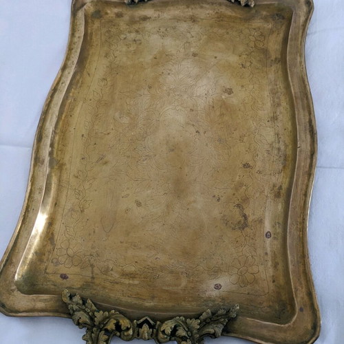 Vintage brass serving tray used with carved handles