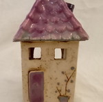 Handmade ceramic candle holder "ROZOS" used
