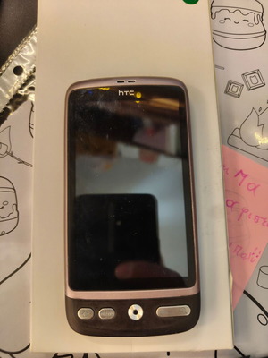 HTC Desire A8181 smartphone used, fully functional, brown