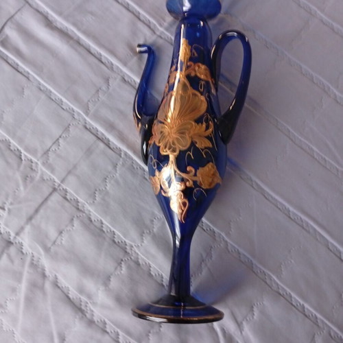 Vintage cobalt blue decorative vase with gold floral motifs