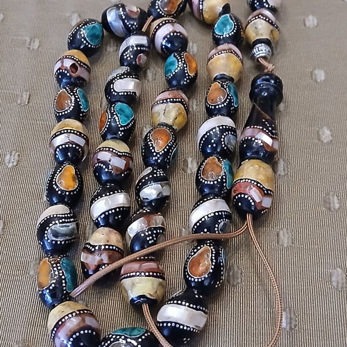 Yiousouri Worry Beads used with amber, mother-of-pearl and silver embroidery