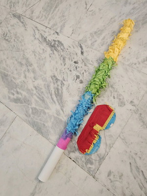 Pinata set like new with stick and mask