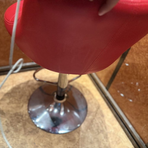 Red adjustable bar stool like new