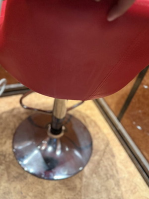 Red adjustable bar stool like new