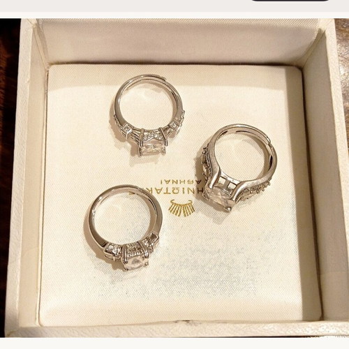 Galerie Tsangarakis rings with white sapphires like new, plated silver
