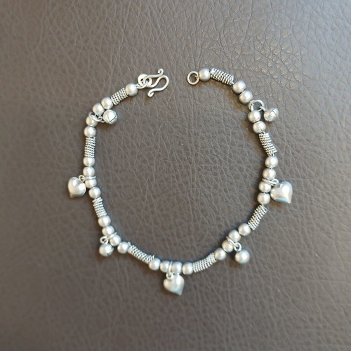Silver 925 bracelet with hanging hearts and beads, like new