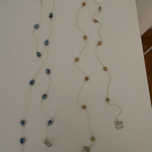 Bra straps new with eye designs and golden hearts
