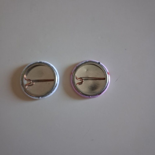 Vintage round pins set with Betty Boop and My Number One, like new