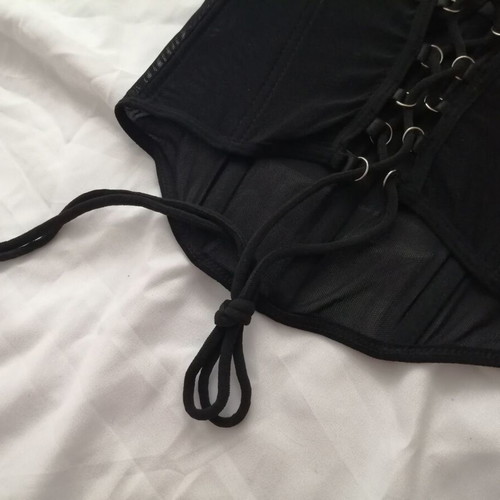 Women's black bustier corset top with sequins and sheer waist