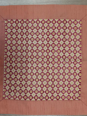 Napkin new with circle pattern in burgundy and gold