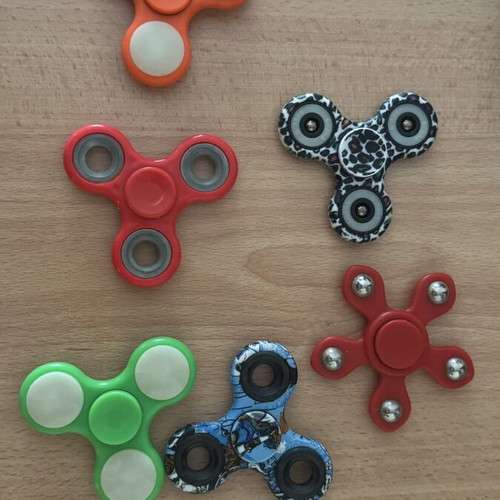 Fidget Spinners like new, assorted colors and designs, set