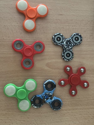 Fidget Spinners like new, assorted colors and designs, set