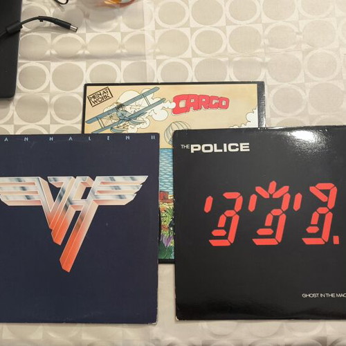 Vinyl records used, pack of about 75 with classic rock artists
