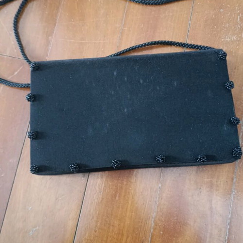 Shoulder bag like new, black with cord and button