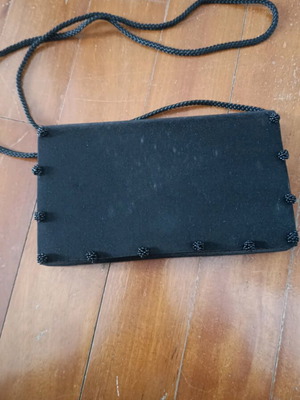Shoulder bag like new, black with cord and button