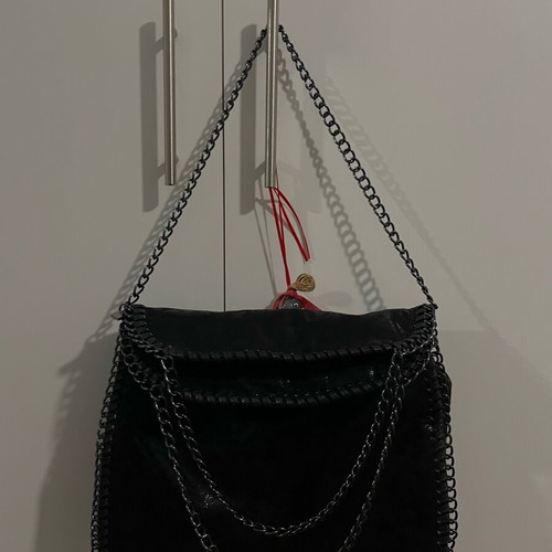 Women's shoulder bag black, new, with chains and zipper