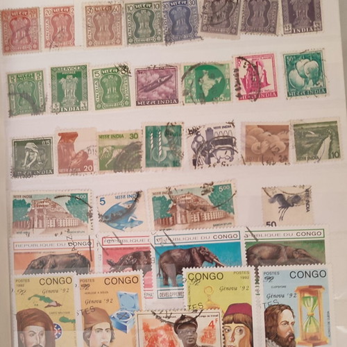 Stamp collection like new, 500+ worldwide in album