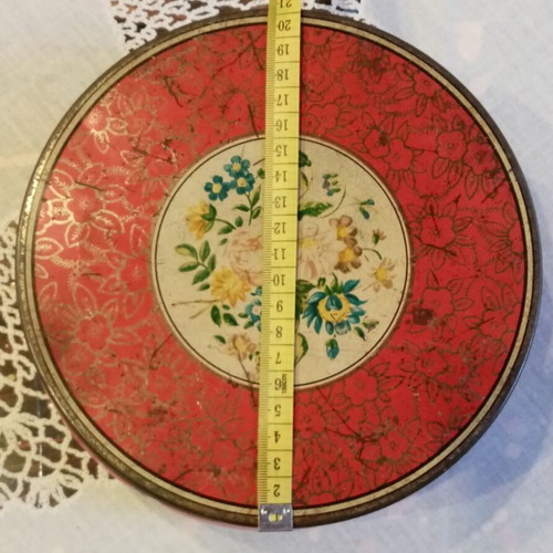 Vintage tin box used with floral and dog motifs