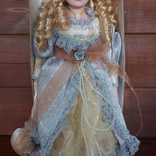 Porcelain doll with stand new, vintage style