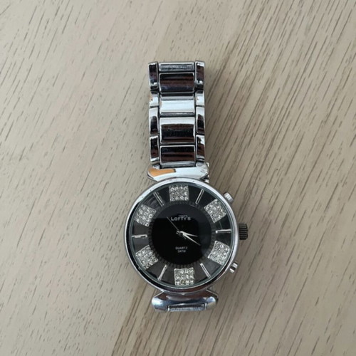 Lofty's women's watch like new with silver metal bracelet