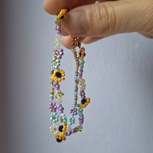 Women's handmade multicolor bracelet with gold tone