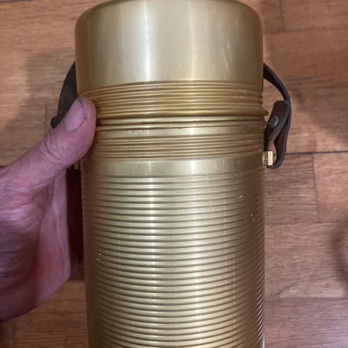 Vintage thermos used with cork and leather strap