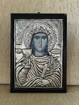 Religious icon used with metal overlay on wooden base