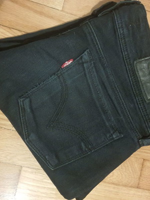 Levi's jeans used, size M, black and light denim
