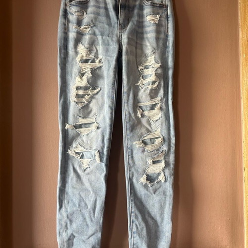 American Eagle stretch jean with rips new size S