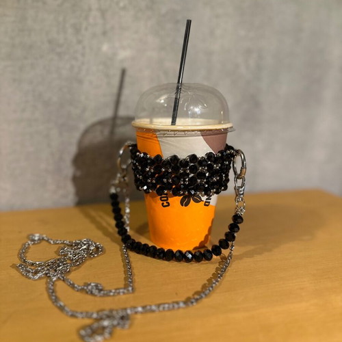 Cup holder handmade with black and silver beads