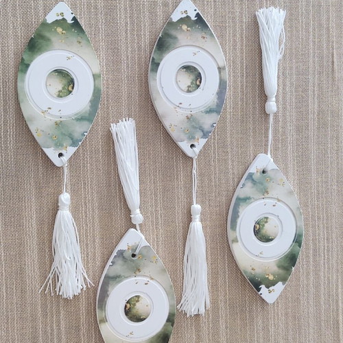 Ceramic gouria and metal eye charm set like new with blue beads and tassels