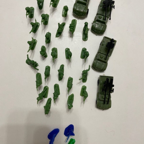 Small toy soldiers used, 26 soldiers, 3 Indians, 4 vehicles