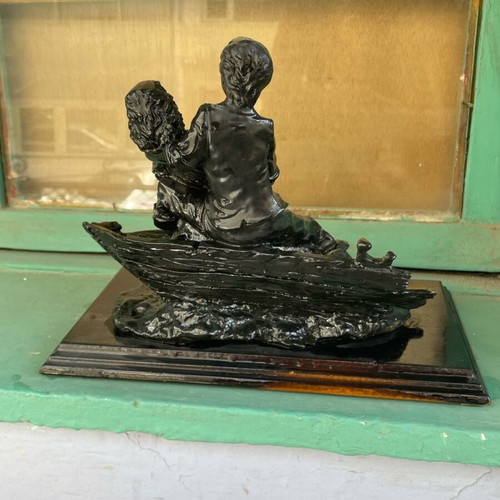 Vintage statue of a loving couple with wooden base like new