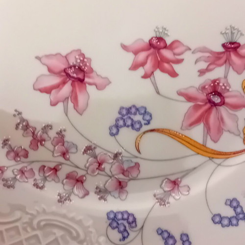 Ionia porcelain dinnerware set with floral relief decoration, 9 pieces