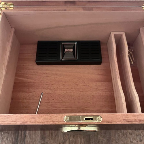Cigar accessories like new with cedar humidifier, Colibri cutter and Xikar hygrometer