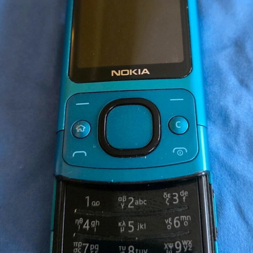 Nokia 6700 Slide used, turquoise, classic slider phone