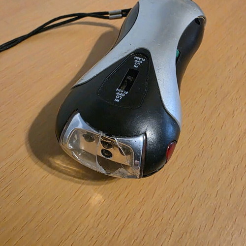 Flashlight with crank used with alarm