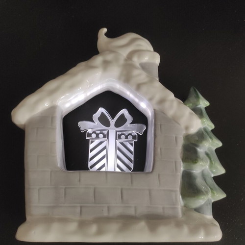 Christmas house with lighted gift, new