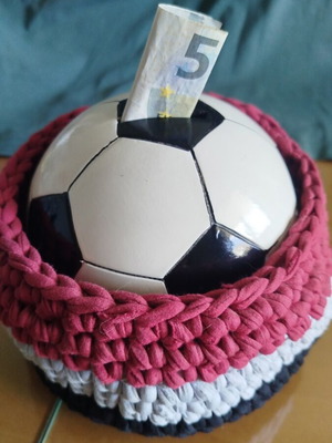 Piggy bank ball clay with handmade basket used