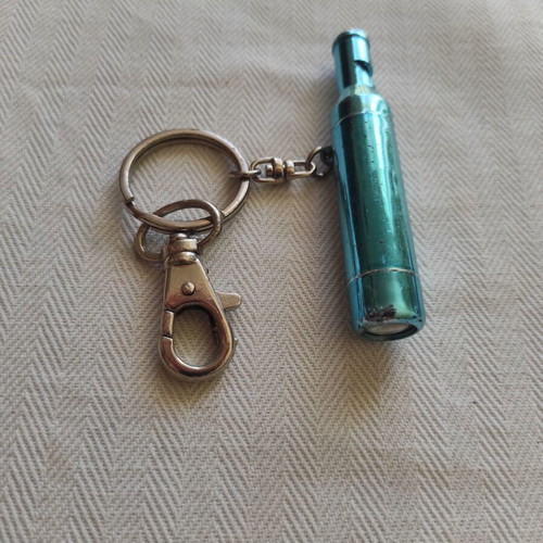 Keychain mini flashlight and laser whistle like new, blue