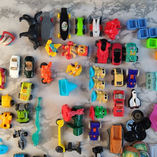 Kinder figures and miniatures used, including Bob Builder, Sonic, Rabbids