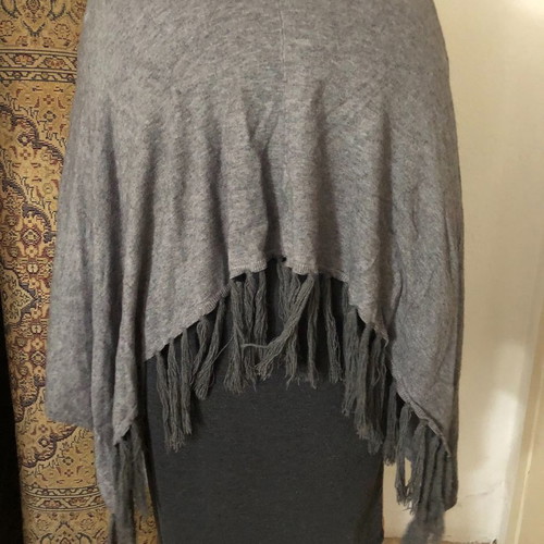 Gray poncho used with fringes