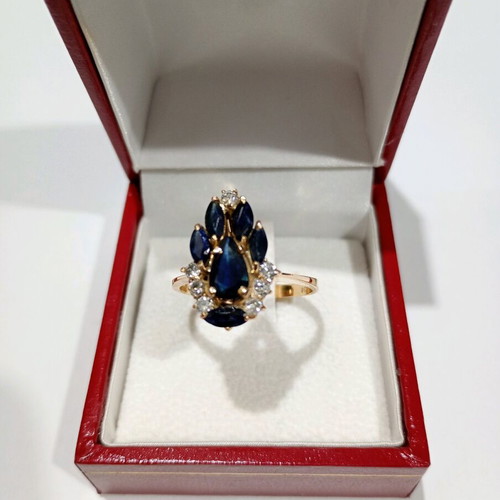 Women's 18k gold ring with sapphires and diamonds like new