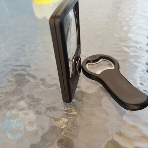Magnifying glass with LED and opener new unused