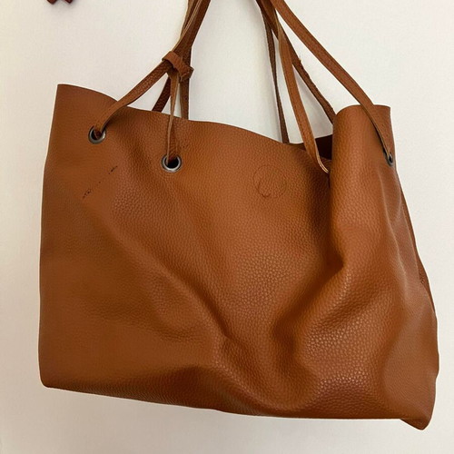 Brown shoulder bag with flap used