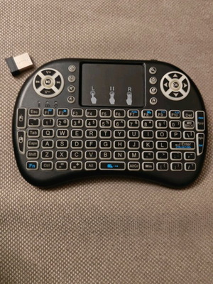 Mini wireless keyboard with touchpad and LED lighting like new