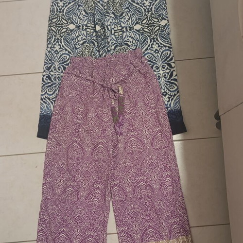 Two Pants like new, one magenta with green, one blue with dark blue, one size