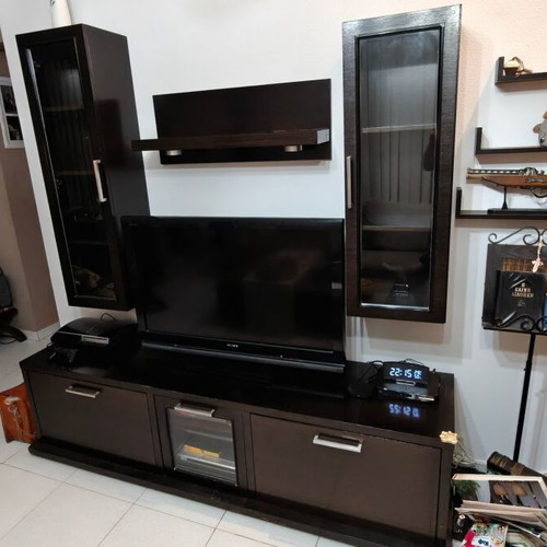 Living room unit used with lower cabinet, wall columns, and shelves