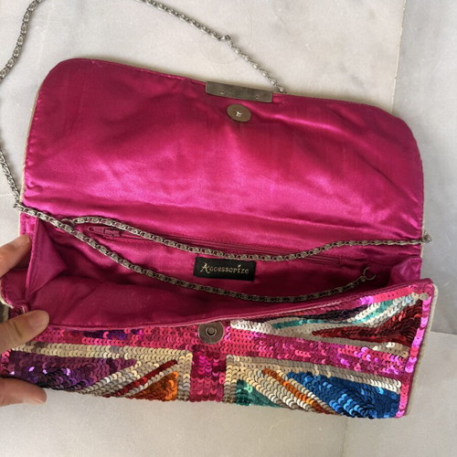 Accessorize clutch like new with colorful sequins and chain